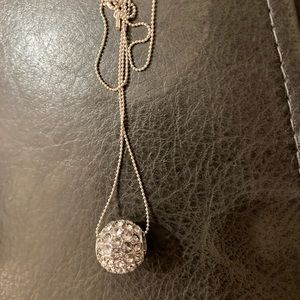 Spherical ball with crystals.